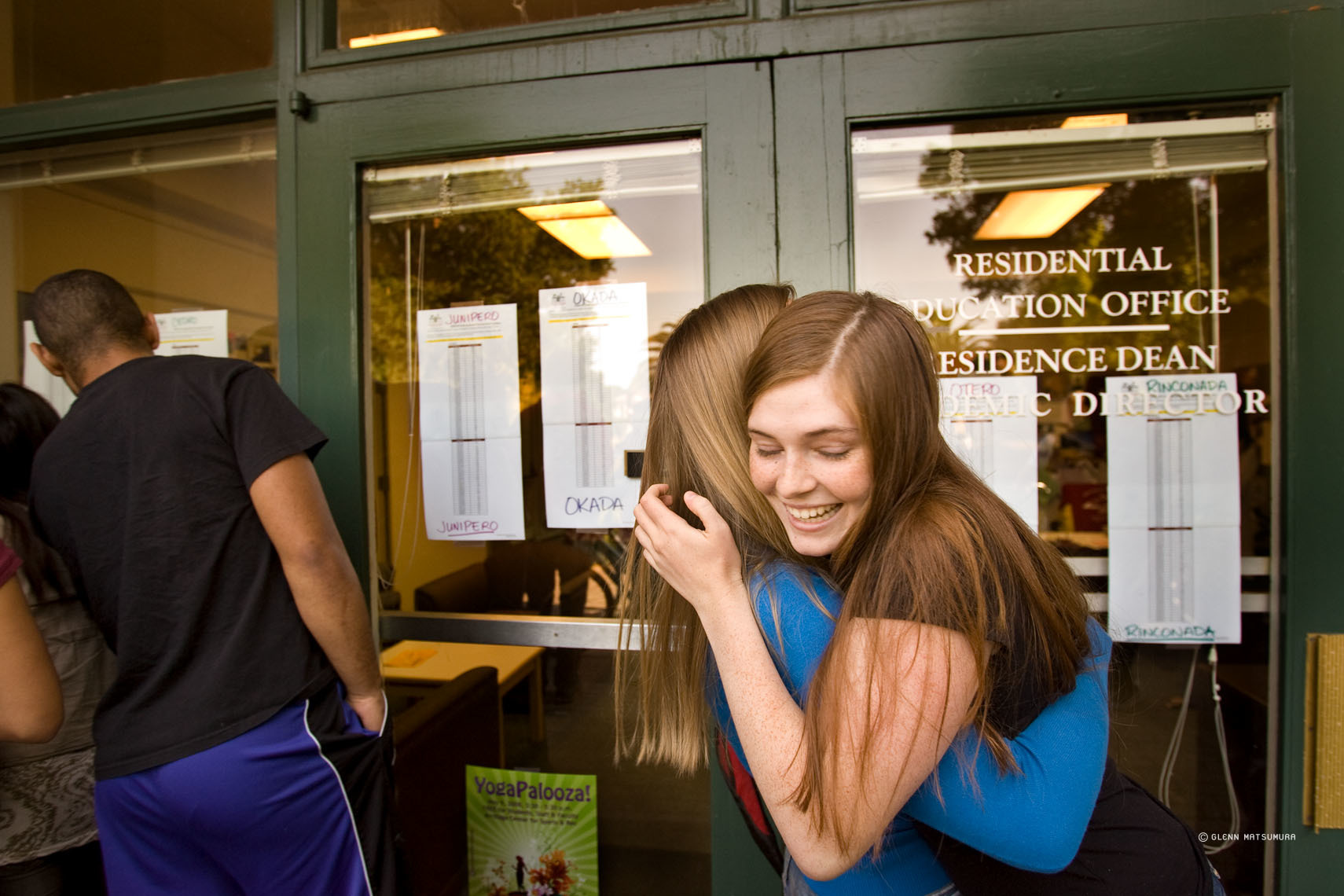 Students celebrating as the housing draw results are posted